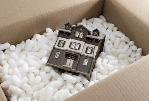 Model house packed in a box with protective material